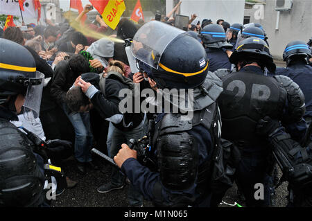 Police officers protect ARKEMA industrial site from protesters intrusion, Pierre-Benite, France Stock Photo