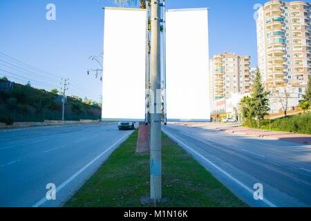 large two flag blank billboard on a street wall banners with room to add your own text Stock Photo