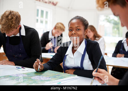 Portrait Of Teenage Students Studying Together In Art Class Stock Photo