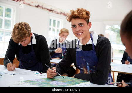 Portrait Of Teenage Students Studying Together In Art Class Stock Photo