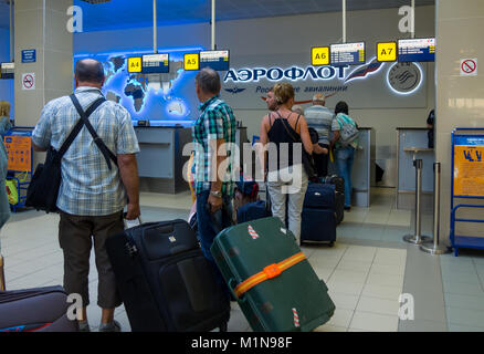 Simferopol, Russia - June 15, 2016: Passengers waiting for registration, at the counter of airline 'Aeroflot', Simferopol airport Stock Photo