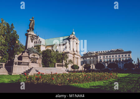 Adam Mickiewicz Statue and Carmelite Church in Warsaw Stock Photo