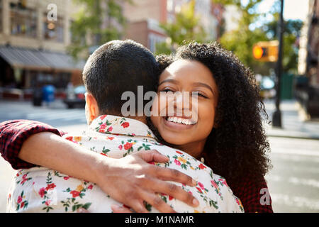 Young Couple Meeting On Urban Street In New York City Stock Photo