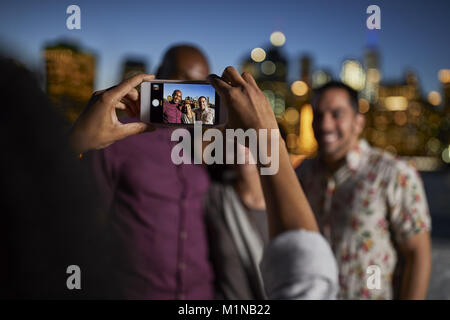 Group Of Friends Posing For Selfie In Front Of Manhattan Skyline Stock Photo