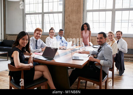 Black businesswoman and team at board meeting look to camera Stock Photo