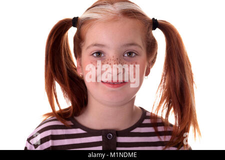 portrait of little red-haired girl with freckles.studio shot Stock Photo