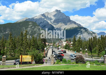 Main street Banff heading toward Mount Norquay, come to Banff and have a blast. Stock Photo