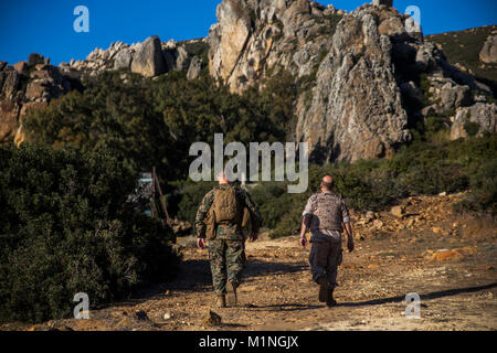 Spanish Marine Col. Juan M. Báez, deputy commander of Trecio de Armada (right), and U.S. Marine Col. Michael J. Perez, the commanding officer of Special Purpose Marine Air-Ground Task Force-Crisis Response-Africa (left), tour Sierra del Retin, Spain, Dec. 20, 2017. SPMAGTF-CR-AF is deployed to conduct limited crisis-response and theater-security operations in Europe and North Africa. (U.S. Marine Corps Stock Photo