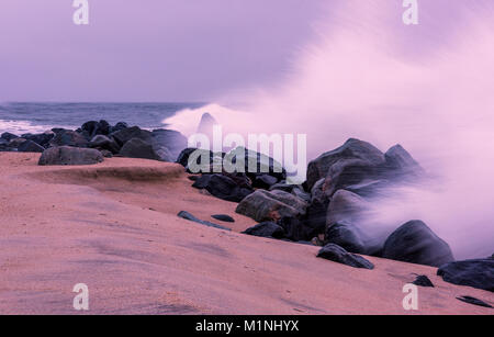 Amazing big waves on the moody morning at Sandy Hook beach in New Jersey Stock Photo