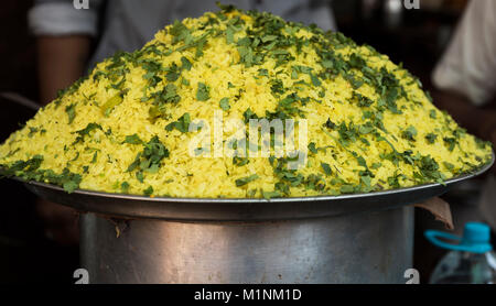 Batata Poha / Indian breakfast with potatoes and flattened rice in Nathdwara, Rajasthan India Stock Photo