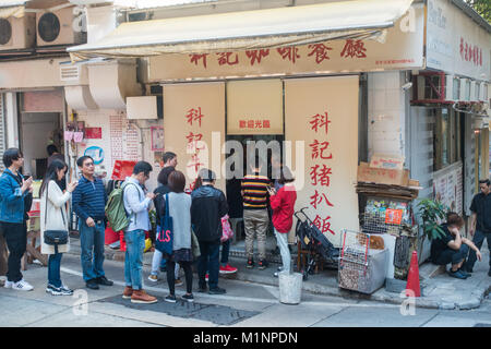 Hong Kong restaurant standing in a line Stock Photo
