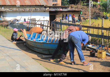 People build boat in Pokhara Nepal. Stock Photo