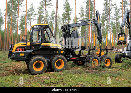 JAMSA, FINLAND - AUGUST 30, 2014: Ponsse forwarder Wisent in a work demonstration. Ponsse presents its new Model Series 2015 at FinnMETKO 2014. Stock Photo