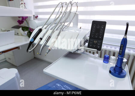 Dental apparatus for repairing teeth in dental ordination without persons Stock Photo