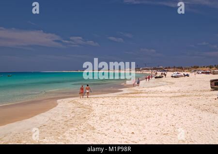 Vacationers strolling on the beautiful sandy beach on the island of Sal, Cape Verde Stock Photo