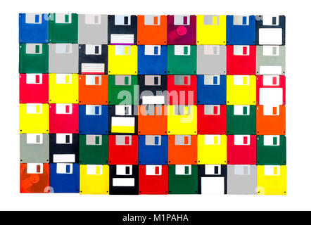 Horizontal shot of a group of multicolored plastic diskettes laid into a solid background.  All fronts.  White background. Stock Photo