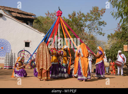 Dancing Dandiya Folk Dance of Gujarat, Udaipur, Rajasthan, India Stock Photo