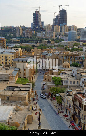 Baku city skyline, Azerbaijan 2010. Looking from the Maiden's tower towards the Flame Towers under construction. Stock Photo