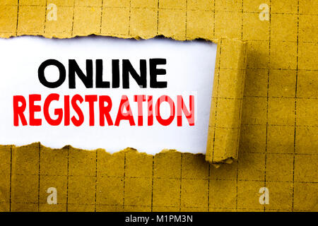 Word, writing Online Registration. Business concept for Internet Login written on white paper on yellow folded paper. Stock Photo