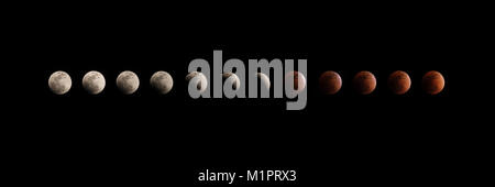 different phases of total lunar eclipse on dark sky Stock Photo