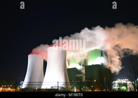 smoking chimneys of a lignite power plant at night Stock Photo - Alamy