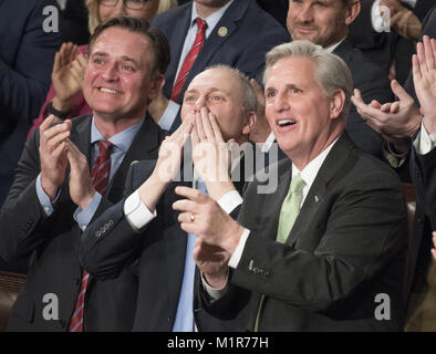 January 30, 2018 - Washington, District of Columbia, U.S. - United States Representative Steve Scalise (Republican of Louisiana), center blows a kiss to the gallery after being recognized during US President Donald J. Trump's first State of the Union address to a joint session of the US Congress in the US House chamber in the US Capitol in Washington, DC on Tuesday, January 30, 2018. At right is US House Majority Leader Kevin McCarthy (Republican of California), and at left is US Representative Luke Messer (Republican of Indiana). Photo Credit: Ron Sachs/CNP/AdMedia (Credit Image: © Ron Sachs Stock Photo