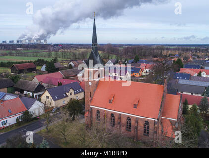 Heinersbrueck, Germany. 1st Feb, 2018. The aerial view of a drone shows the village church in Heinersbrueck, Germany, 1 February 2018. Brandenburg's village church of the month February is situated next to the brown coal opencast mine Jaenschwalde. The neo-gothic buidling was finished in 1901. The sponsoring society 'Old Churches Berlin-Brandenburg' places one church under the spotlight every month. Credit: Patrick Pleul/dpa-Zentralbild/ZB/dpa/Alamy Live News Stock Photo