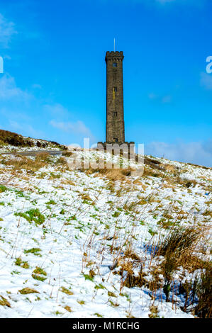 Holcombe Hill, Lancashire, UK. 1st February, 2018. Beautiful cold, crisp and sunny weather on the first day of February at Holcombe Hill, near Bury, Lancashire, as a dusting of snow covers the hill top near the Peel Monument. Built in 1852 this well known Bury landmark was erected in tribute to one of Bury's most famous sons, Sir Robert Peel; founder of the Police force and Prime Minister 1841-1846. Picture by Paul Heyes, Thursday February 01, 2018. Credit: Paul Heyes/Alamy Live News Stock Photo