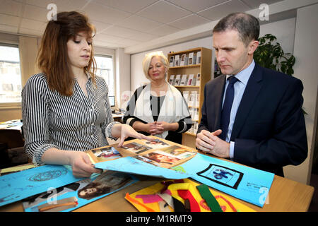 Justice Secretary Michael Matheson talks with Brenna Jessie (left) external affairs officer and Marsha Scott, chief executive of Scottish Women's Aid, during a visit to their head office of in Edinburgh, which has been given an extra &pound;165,000 of funding, as Holyrood is expected to pass a new law on domestic abuse. Stock Photo