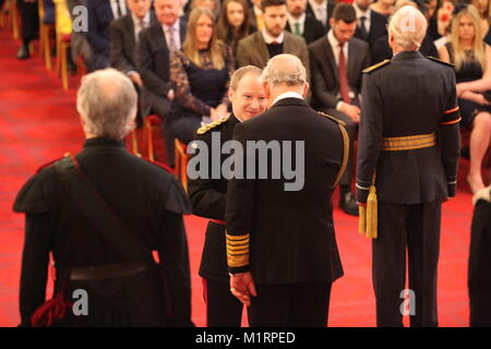 Major Simon Guest, Royal Army Medical Corps, is made an OBE (Officer of the Order of the British Empire) by Prince of Wales at Buckingham Palace. Stock Photo