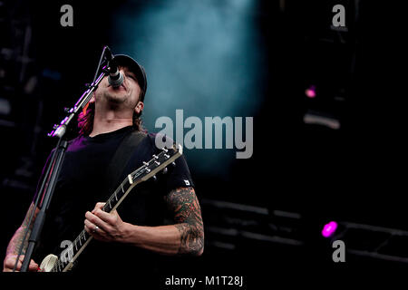 The Swedish punk rock band Millencolin performs a live concert at Koengen in Bergen. Here guitarist Mathias Färm is seen live on stage. Norway, 19/06 2011. Stock Photo