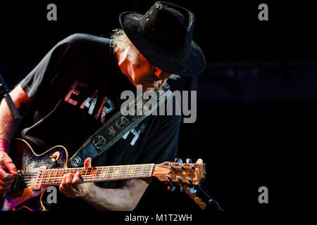 The Canadian, singer, songwriter and musician Neil Young performs a live concert at Koengen in Bergen. Neil Young performed the concert with the band Crazy Horse. Norway, 01/08 2014. Stock Photo