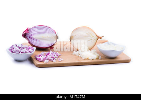 Red and white onion cut and all on a wooden bottom in white background Stock Photo