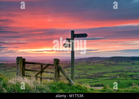 Sneck Yate Signpost along The Cleveland Way long distance footpath at Whitestone Cliff just north from Sutton bank, Thirsk, North Yorkshire, UK. Stock Photo