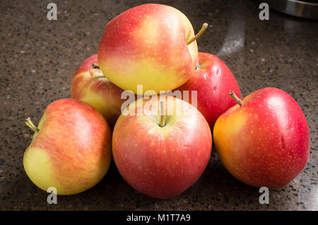 Selection of shop-bought Kansi apples variety Nicoter characterised by coloour, taste and crispness Stock Photo