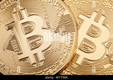 Golden Bitcoin coins background, cryptocurrency Stock Photo