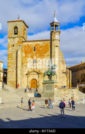 TRUJILLO, SPAIN - DECEMBER 30, 2017: Scene of Plaza Mayor, with San Martin church, locals and visitors, in Trujillo, Extremadura, Spain Stock Photo