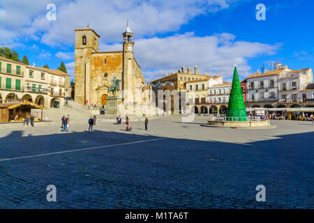 TRUJILLO, SPAIN - DECEMBER 30, 2017: Scene of Plaza Mayor, with San Martin church, a Christmas tree, locals and visitors, in Trujillo, Extremadura, Sp Stock Photo