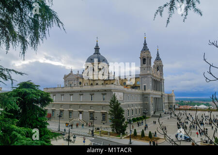 MADRID, SPAIN - DECEMBER 31, 2017: View of the Cathedral, with locals and visitors, in Madrid, Spain Stock Photo