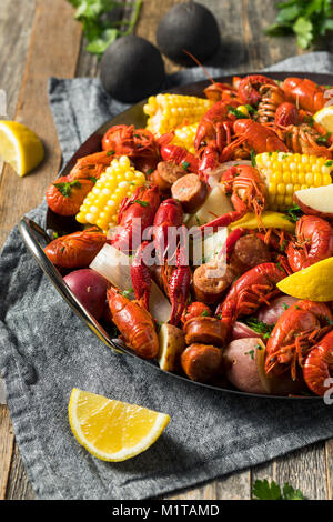 Homemade Southern Crawfish Boil with Potatoes Sausage and Corn Stock Photo