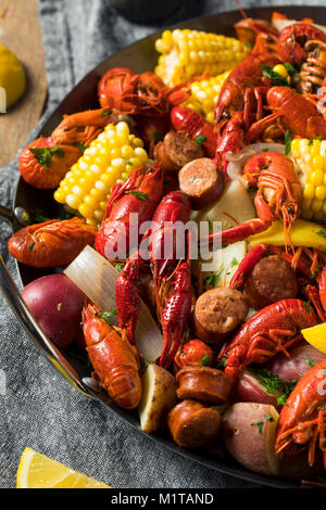 Homemade Southern Crawfish Boil with Potatoes Sausage and Corn Stock Photo