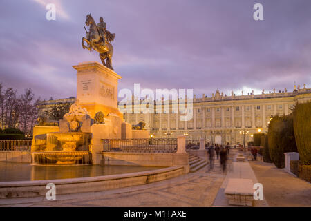 MADRID, SPAIN - JANUARY 1, 2018: The Monument to Philip IV or Fountain of Philip IV at sunset, with locals and visitors, in Plaza de Oriente, Madrid,  Stock Photo