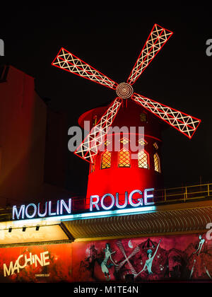 Paris, France - January 7, 2017: The Moulin Rouge at night. It is a famous cabaret built in 1889, locating in Montmartre district. Stock Photo