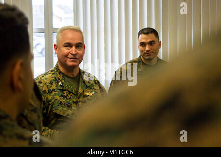 Col. Ricardo Martinez, chief of staff, Marine Air Ground Task Force Training Command, Marine Corps Air Ground Combat Center, speaks to Marines with the Fleet Assistance Program at the opening of the Tax Center aboard MCAGCC, alongside Capt. Adam LoCascio, officer in charge of the Tax Center, Legal Services Support Team, Headquarters Battalion, Jan. 29, 2018. The Tax Center offers free assistance to Marines during Tax season. (U.S. Marine Corps Stock Photo