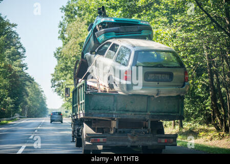 Damaged Car Being Loaded On An ADAC Tow-truck After An Accident, Broken ...