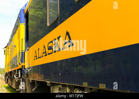 Talkeetna, Alaska, USA - May 19, 2017: An Alaska Railroad Train waiting on a holding track near Talkeetna Depot. Stock Photo