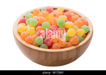 Close up of a wooden bowl of Gummy Fruit candy isolated on a white background with a clipping path Stock Photo