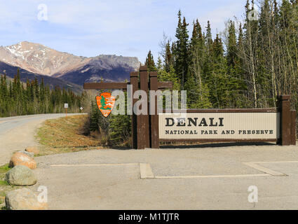 Denali National Park, Alaska, USA - May 21, 2017: Entrance of the Park with a sign in the front and a road in the back. Stock Photo