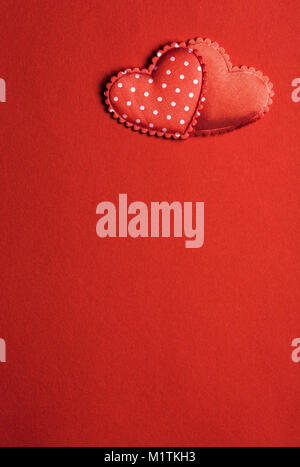 Red background image with two hearts Stock Photo