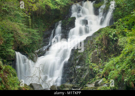Torc Waterfall set with Killarney National Park on the Ring of Kerry, County Kerry, Ireland - John Gollop Stock Photo